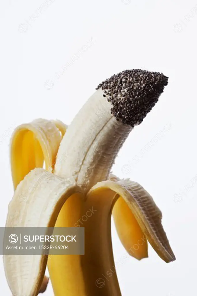 A Partially Peeled Banana with Chia Seeds