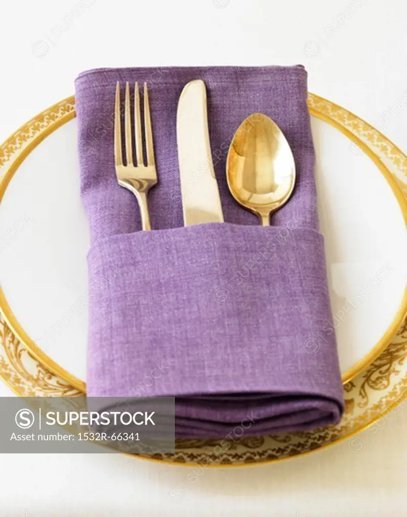 A Place Setting with a Purple Napkin