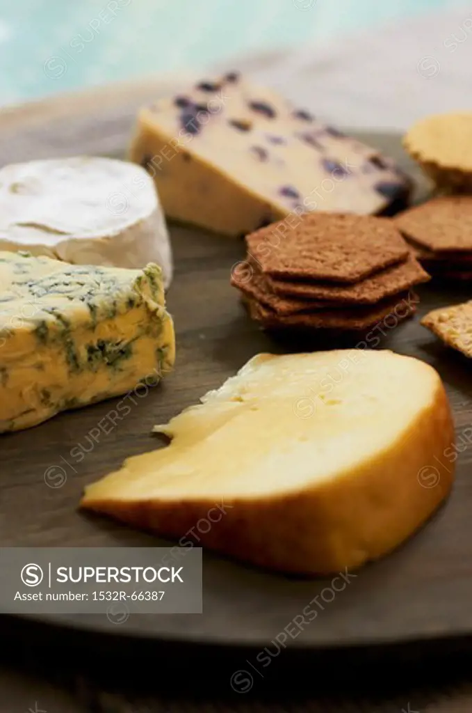A cheese platter with crackers