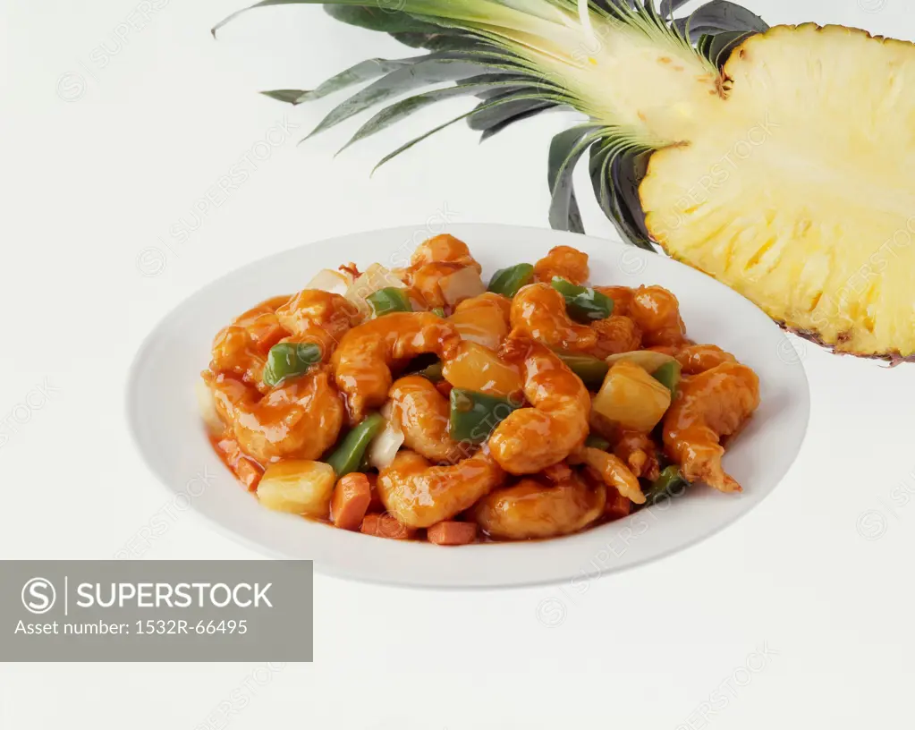 Sweet and Sour Shrimp Stir Fry in a White Bowl; Pineapple<br />