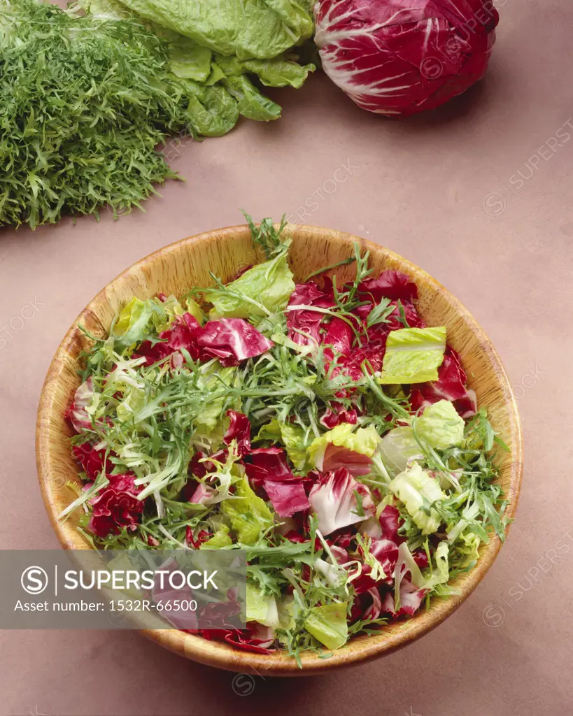 Mixed Greens and Radicchio Salad in Wooden Bowl; From Above<br />