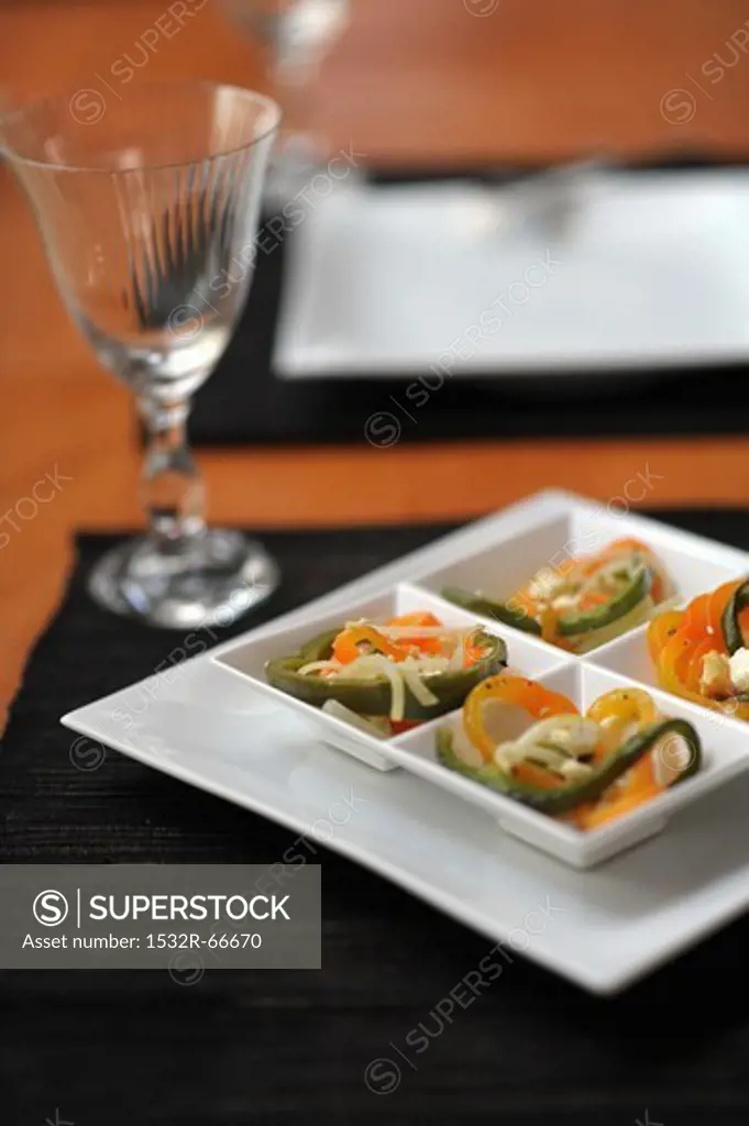 An appetiser of peppers, onions and sheep's cheese