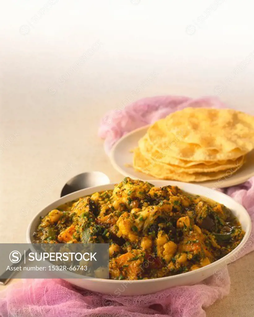 Vegetable curry with chickpeas and flatbread
