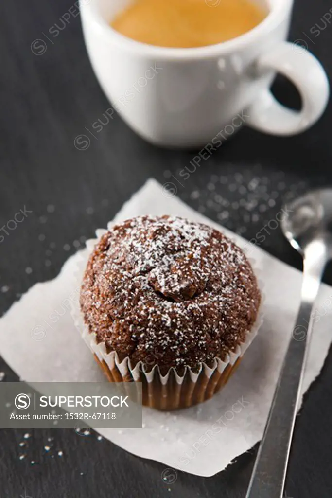 Chocolate muffin with a cup of espresso