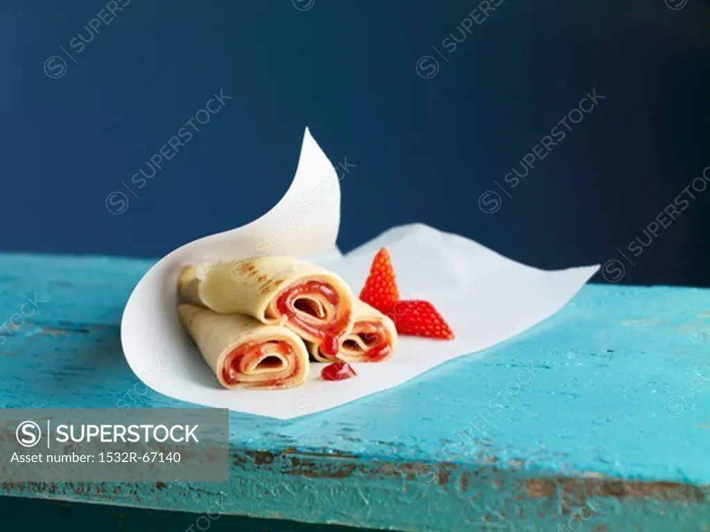 Crepe rolls filled with strawberry marmalade