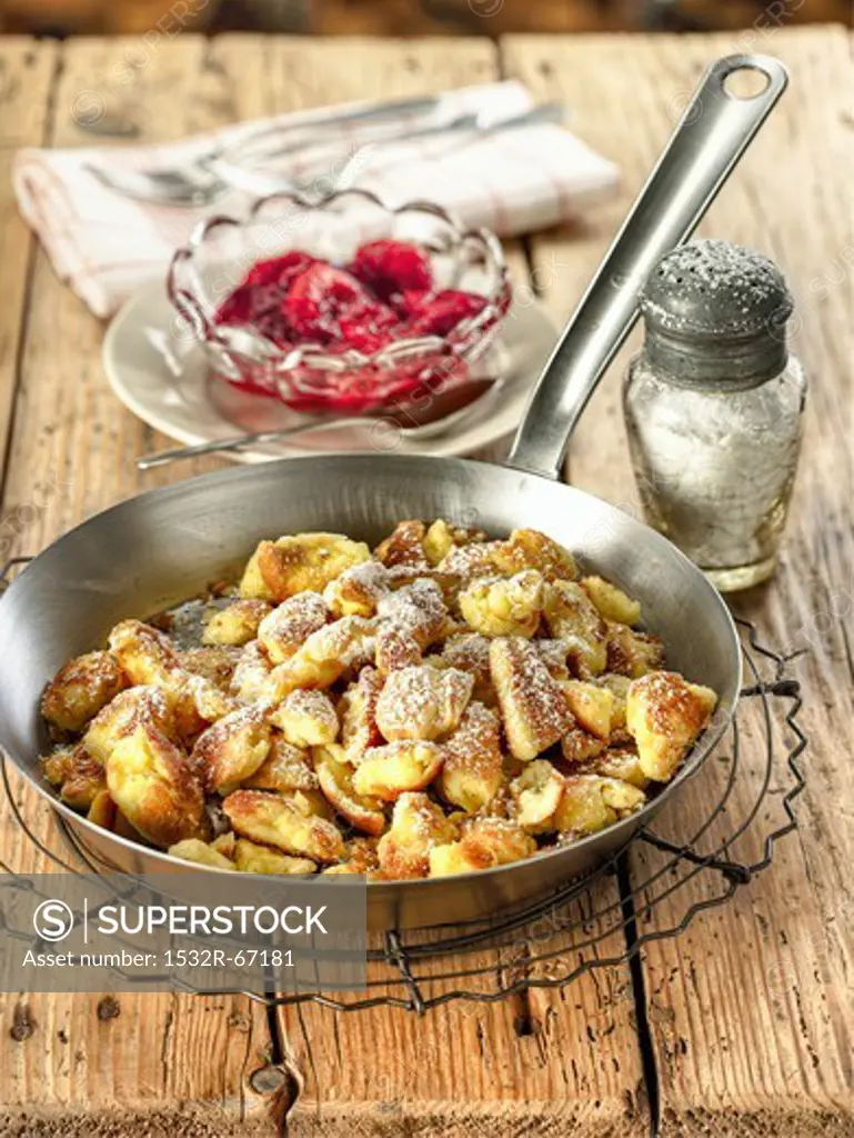 Kaiserschmarren (bite size pieces of sweet pancakes) with stewed plums
