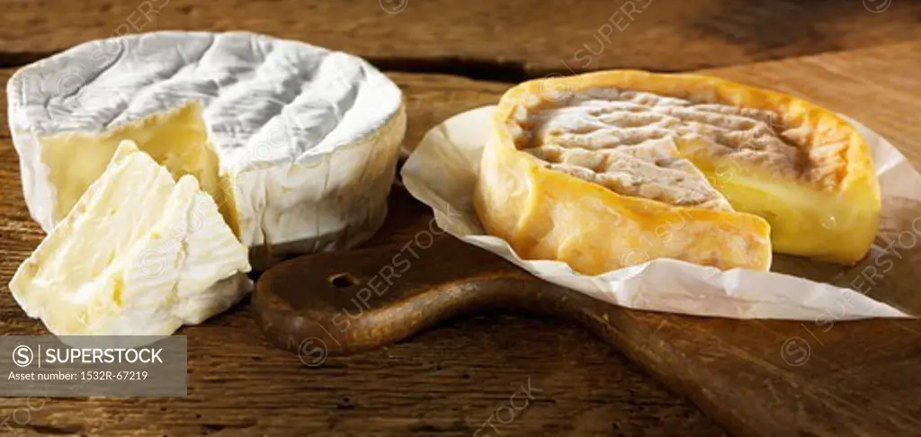 Sliced camembert on a cutting board