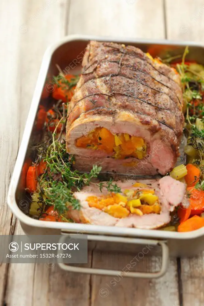 Pork neck stuffed with dried apricots and leeks