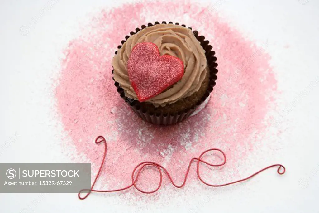 Chocolate cupcake with a red heart