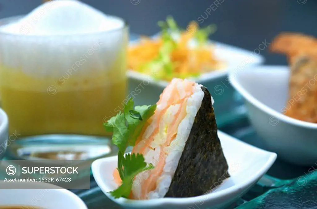 A sushi triangle with salmon