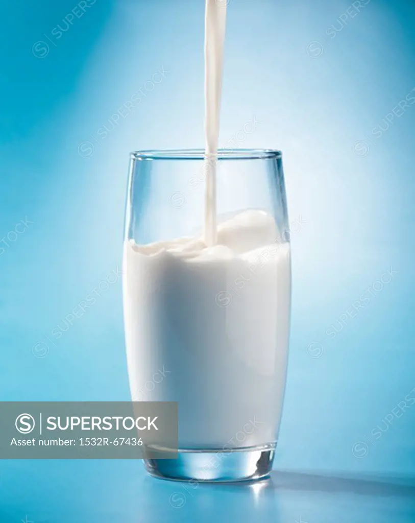 Pouring milk into a glass