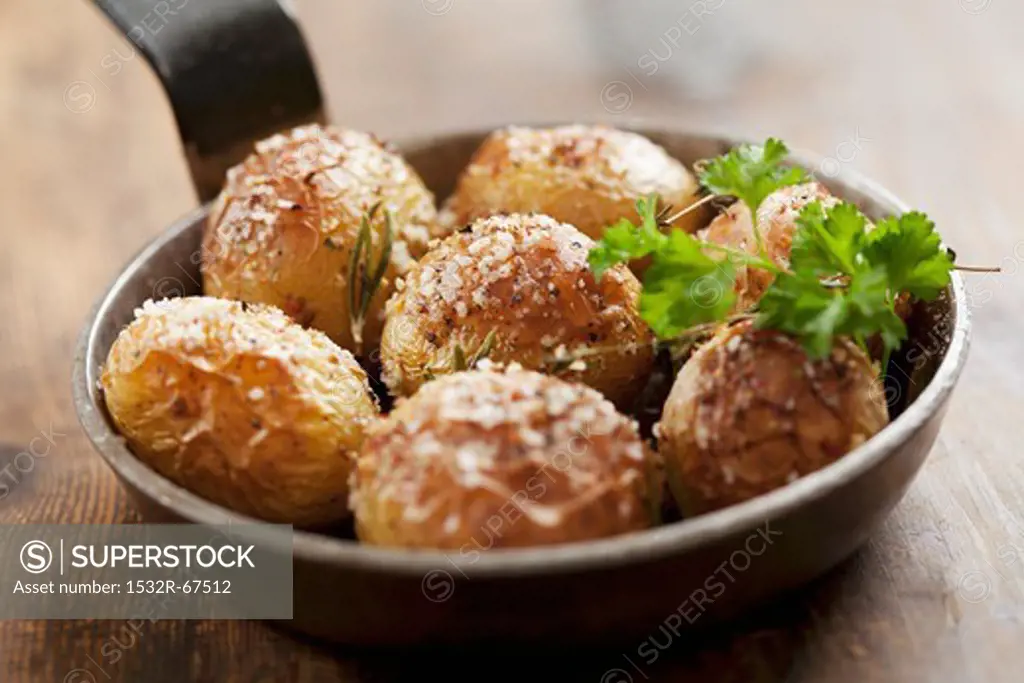 Roast potatoes with salt and rosemary fresh from the oven