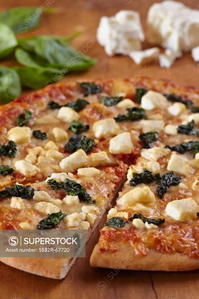 Spinach and Feta Cheese Pizza Sliced Once