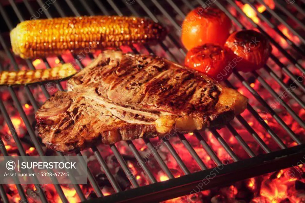 Barbecued T-bone steak with barbecued vegetables