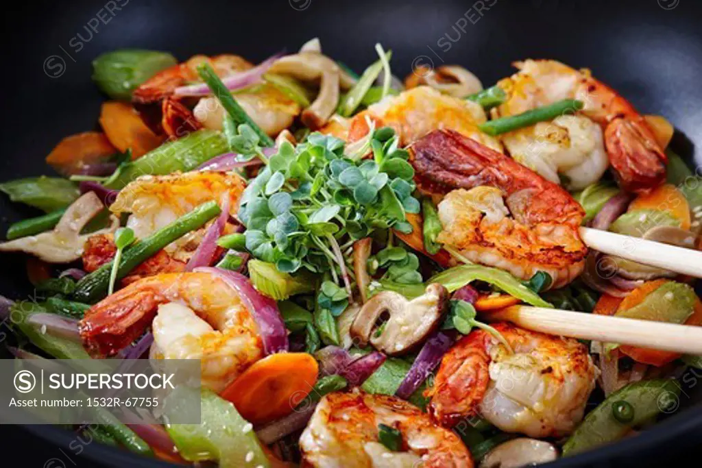 Stir-fried vegetables with king prawns