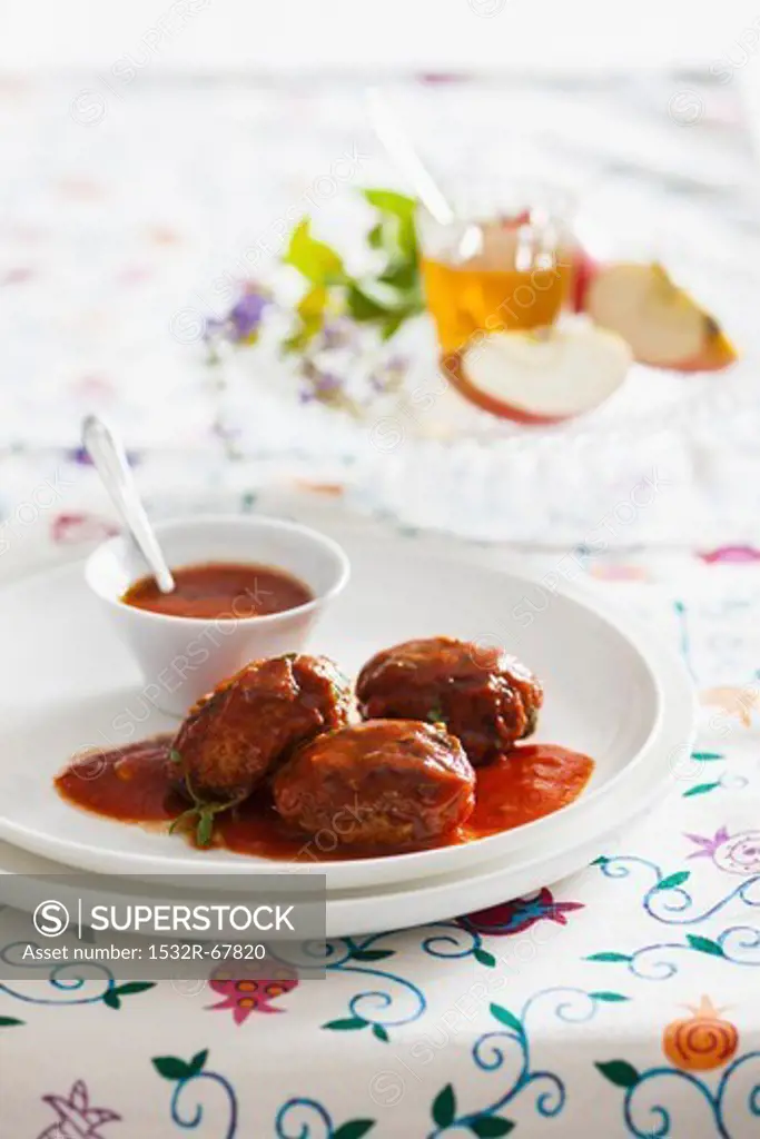Fish cakes with tomato sauce