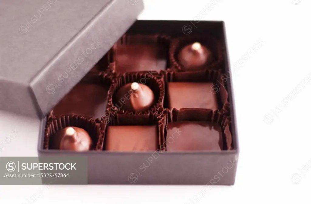 A Box of Assorted Chocolates on a White Background