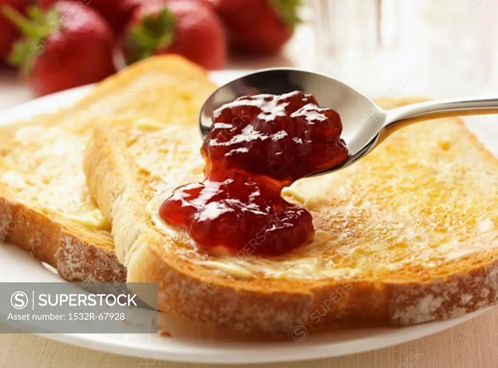 Toast with butter and strawberry jam