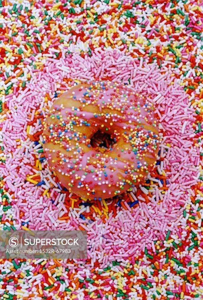 a doughnut with hundred and thousand sweets
