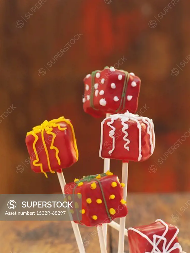 Cake pops decorated to look like wrapped presents