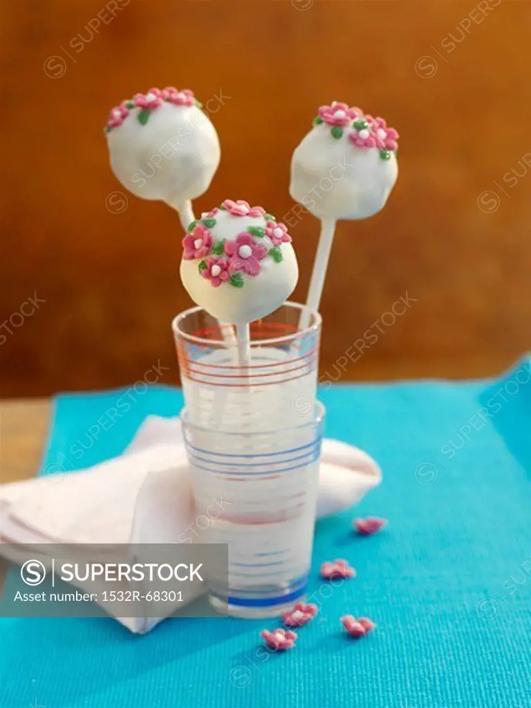 White cake pops with sugar flowers