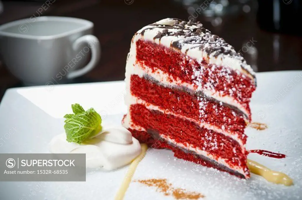 A slice of Layered Red Velvet Cake