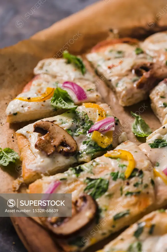 Mushroom, Red Onion, Yellow Pepper and Basil Pizza; Sliced