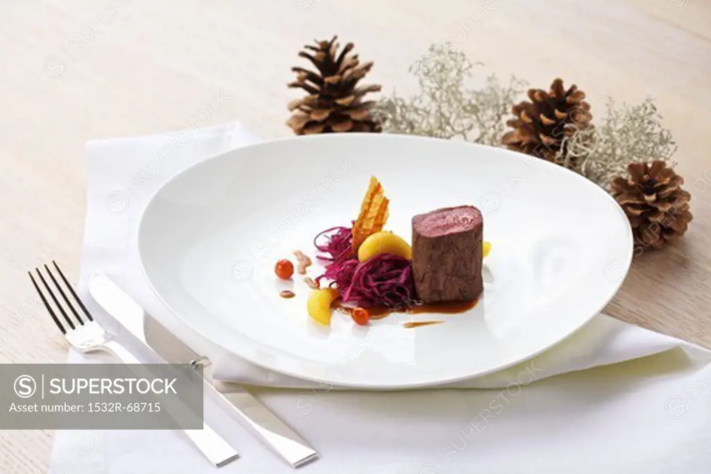 Saddle of venison with red cabbage and apple, for Christmas