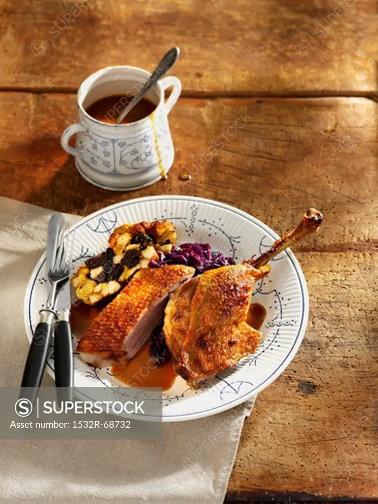 Traditional roast duck with red cabbage and stuffing