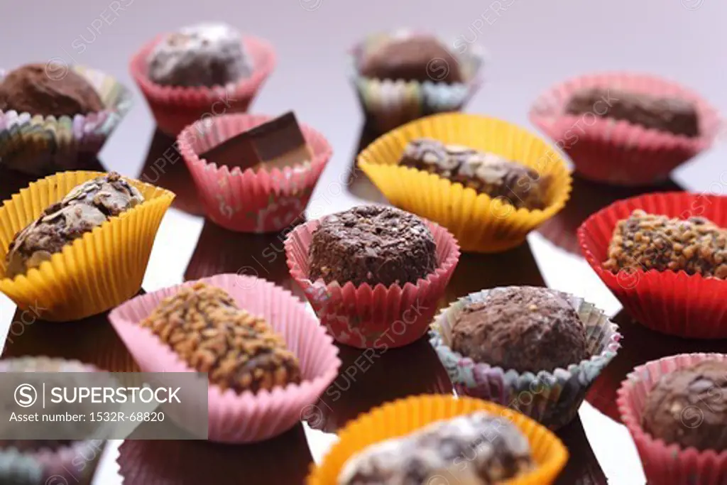 Assorted filled chocolates in colourful paper cases