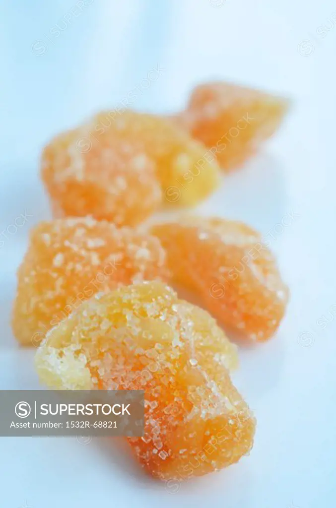 Pile of Candied Ginger on White Background