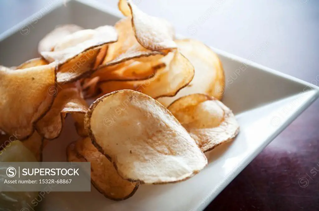 Fresh Cut Potato Chips on a White Dish