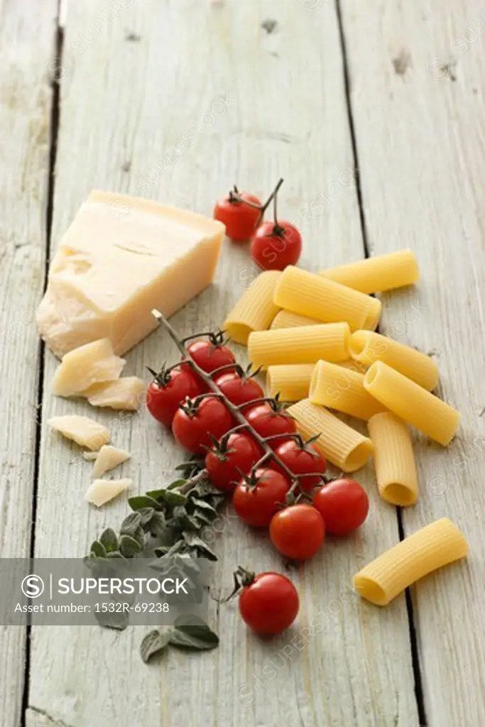 Pasta, tomatoes, oregano and Grana Padano cheese