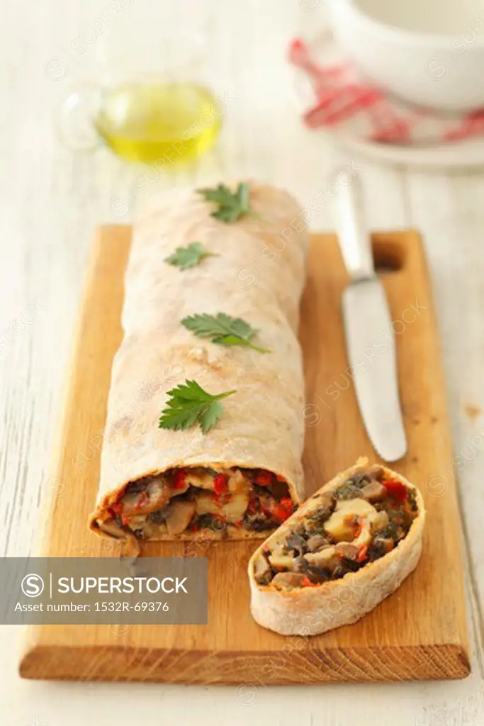 Mushroom strudel with peppers