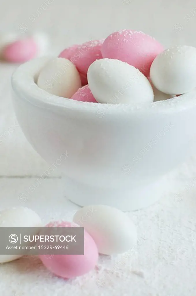Sugar eggs in and next to a bowl
