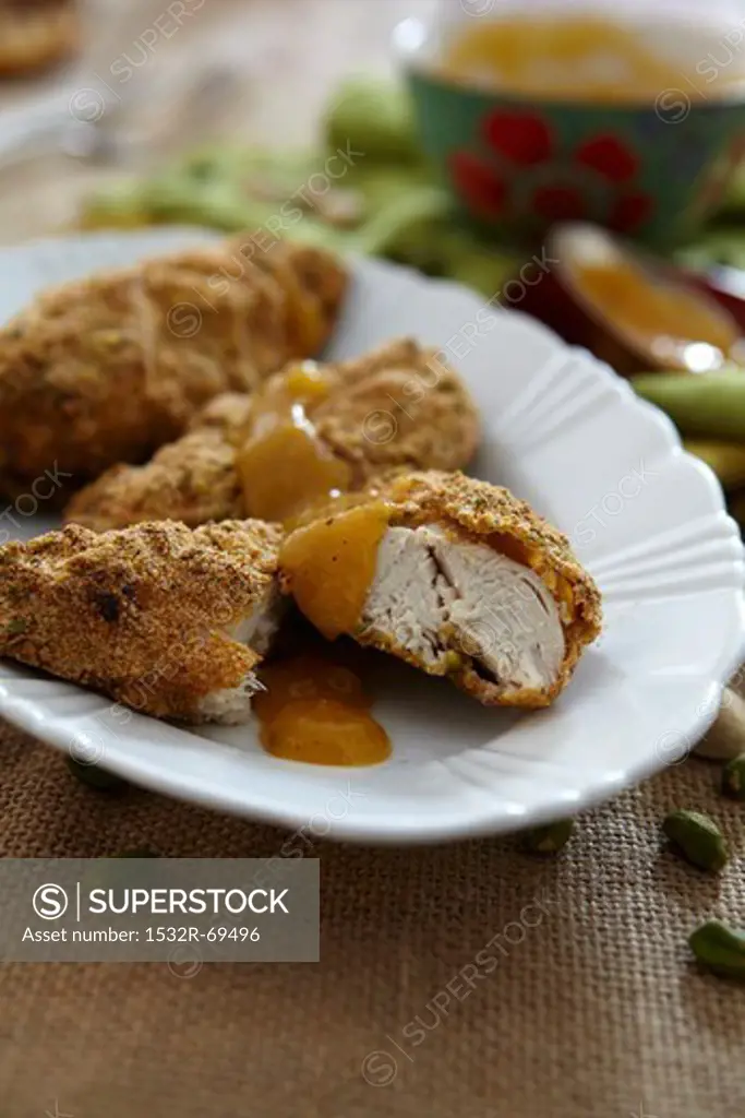 Chicken breast with a pistachio crust and apricot sauce