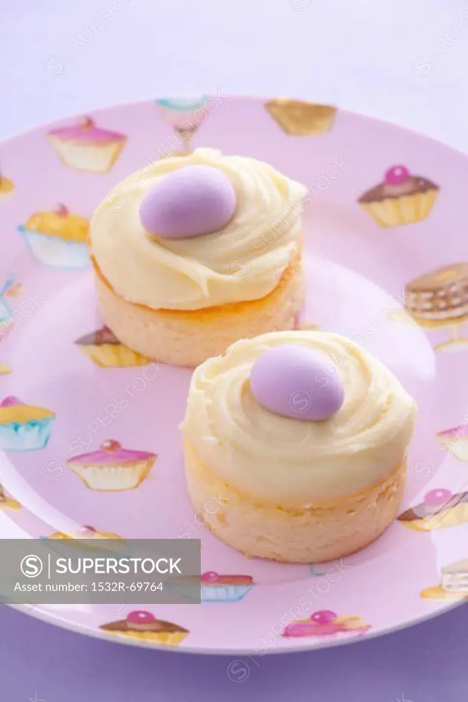 Mini cheesecakes with vanilla custard and marzipan eggs
