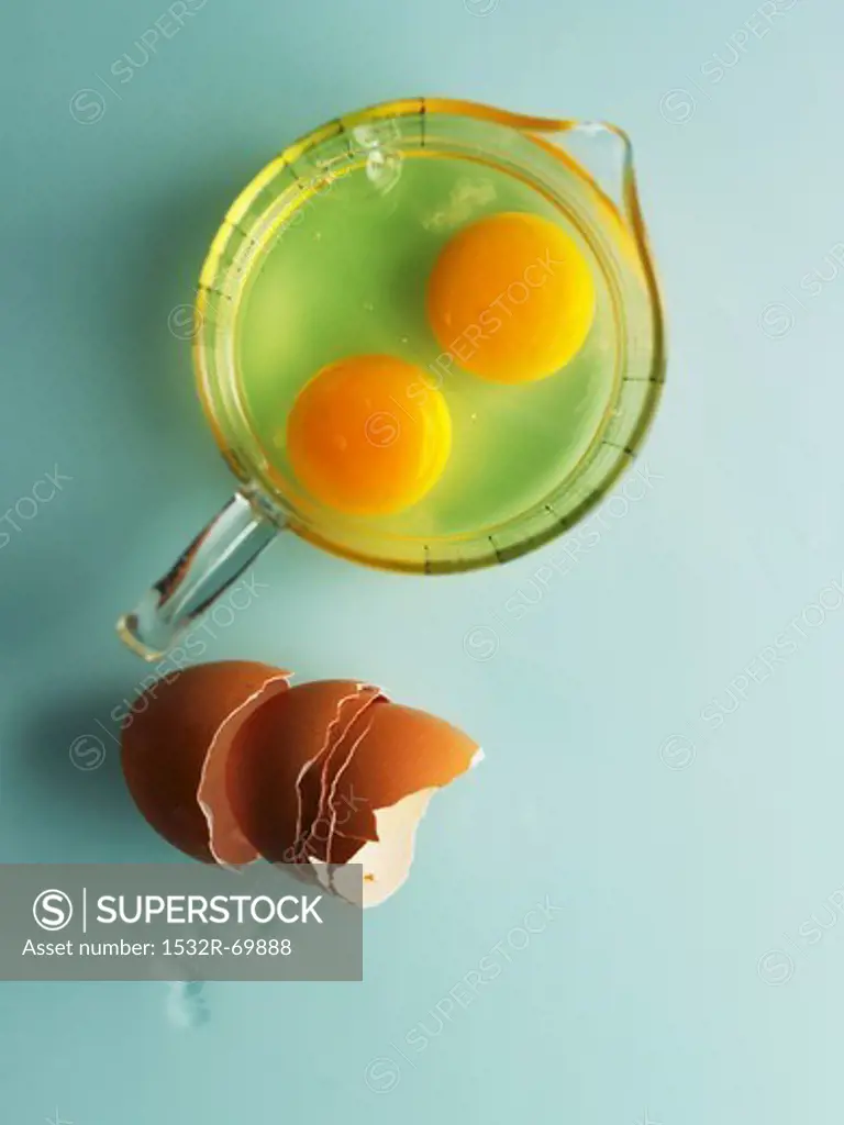 Two raw eggs in a measuring jug
