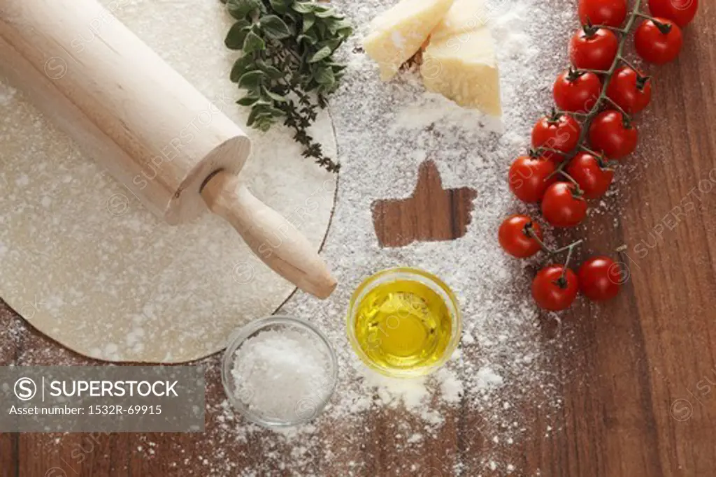 Ingredients for a margherita pizza, with a 'like' symbol
