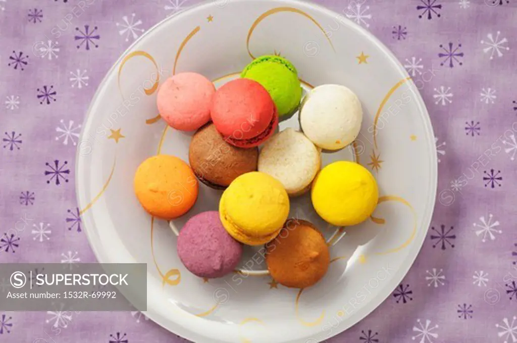 Colourful macaroons on a plate (Christmassy)