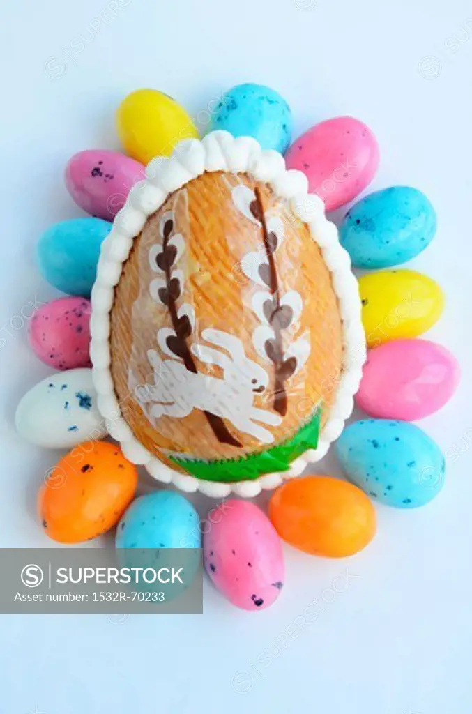 A crispy egg surrounded by colourful miniature eggs