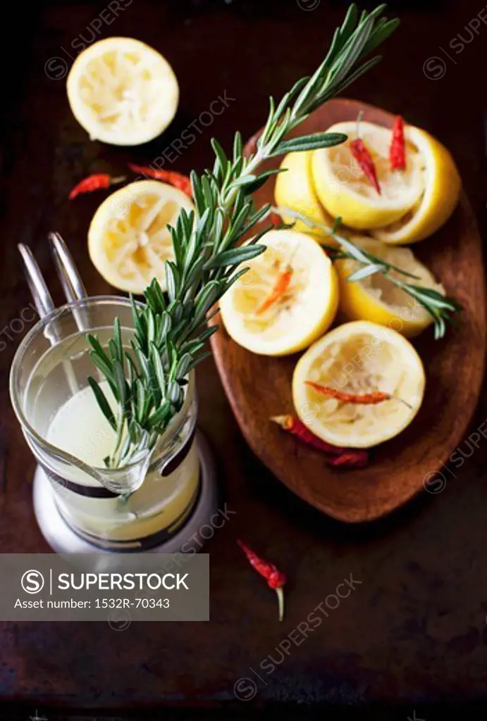 Squeezed Lemons with Rosemary and Red Chili Peppers