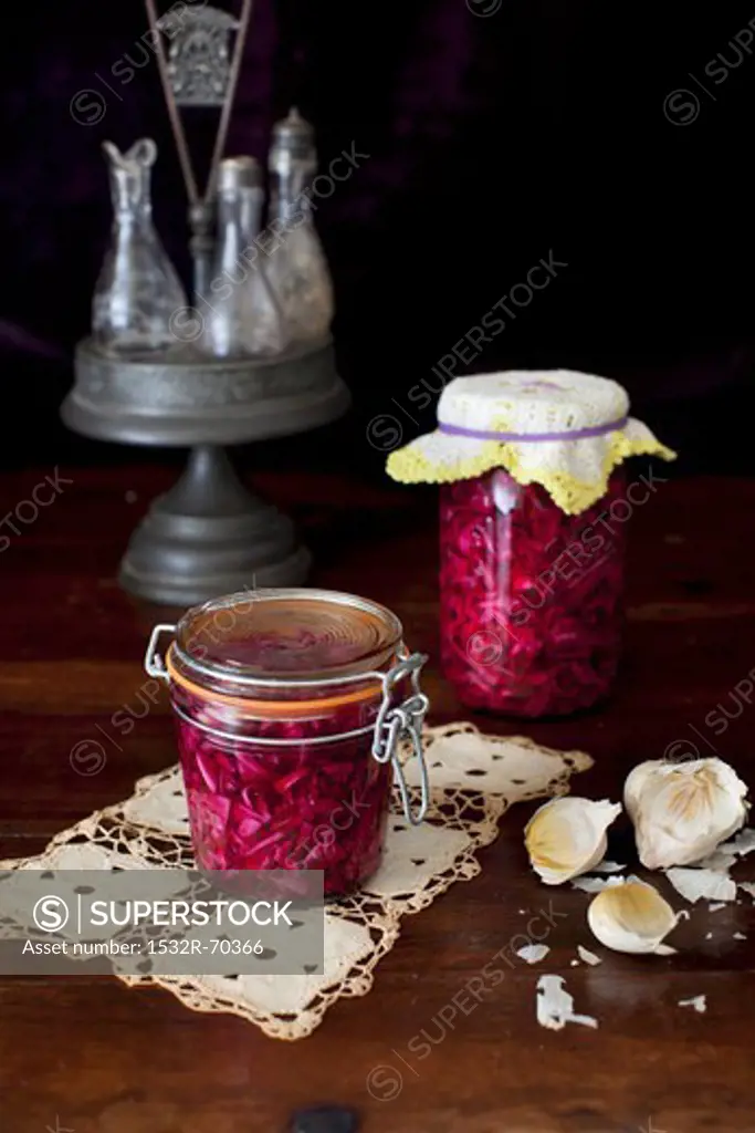 Jars of Pickled Cabbage; Garlic Bulbs