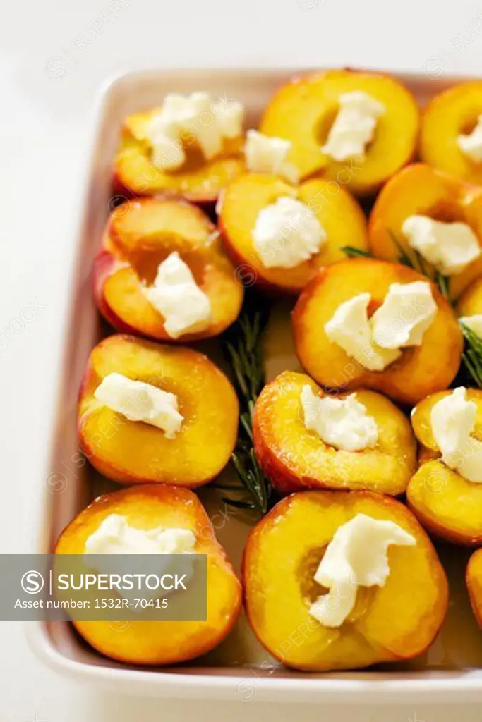 Preparing Roasted Peaches with Honey and Rosemary
