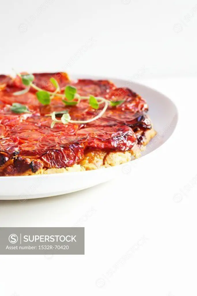 Tomato Tatin on a White Plate