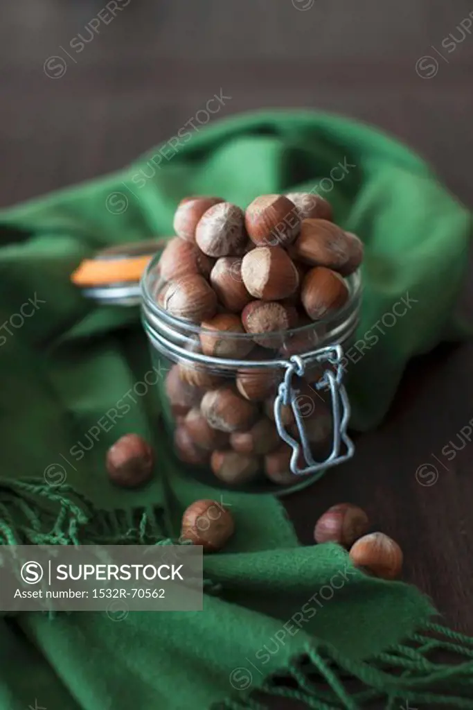 An Open Canister of Hazelnuts