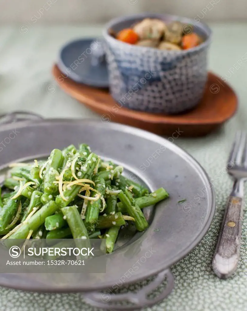 Green Bean Salad with a Bowl of Curried Turkey Stew in the Background