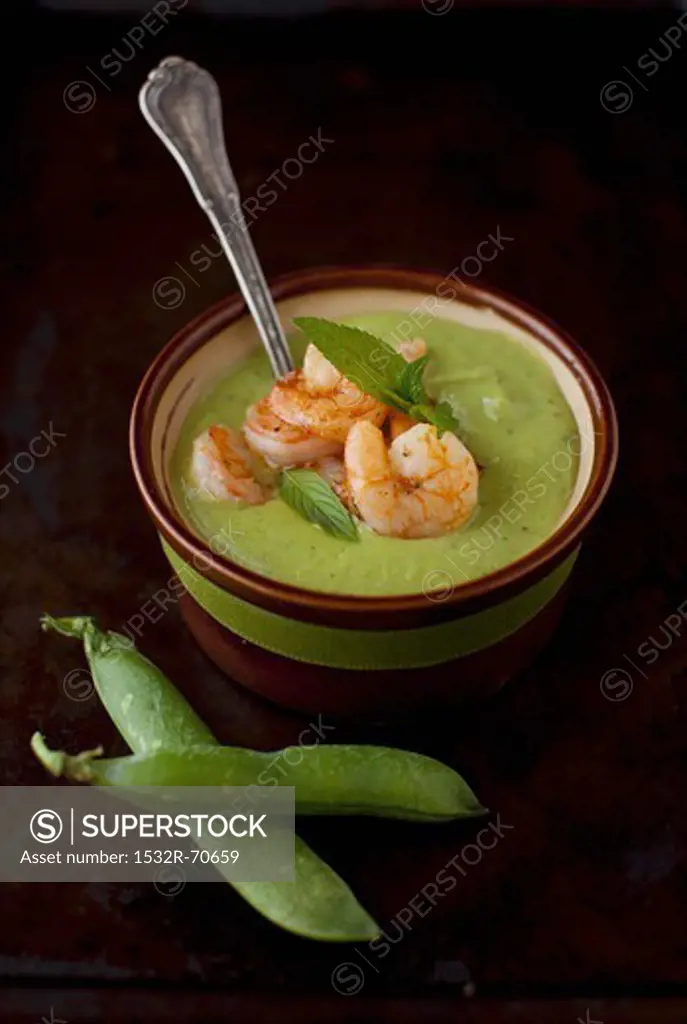 A Bowl of Green Pea and Mint Soup with Shrimp