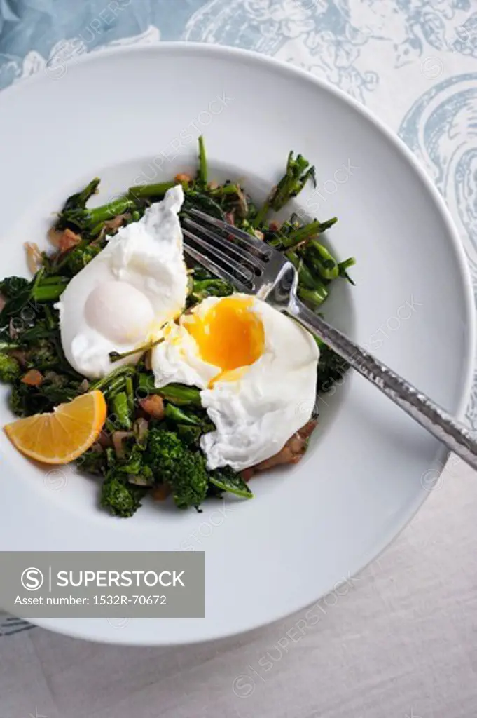 Two Poached Eggs Over Sauteed Broccoli Rabe with Shallots and Pancetta