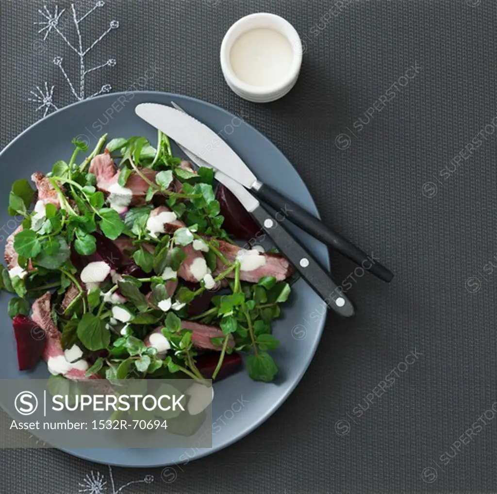 A salad of grilled lamb, watercress, beetroot and aioli